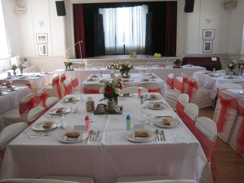 (50) wedding: view from the main entrance towards the stage and top table. image