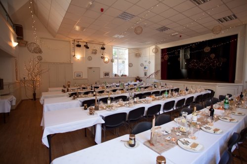 (60) a dinner - with serving tables at the end of each long table. image